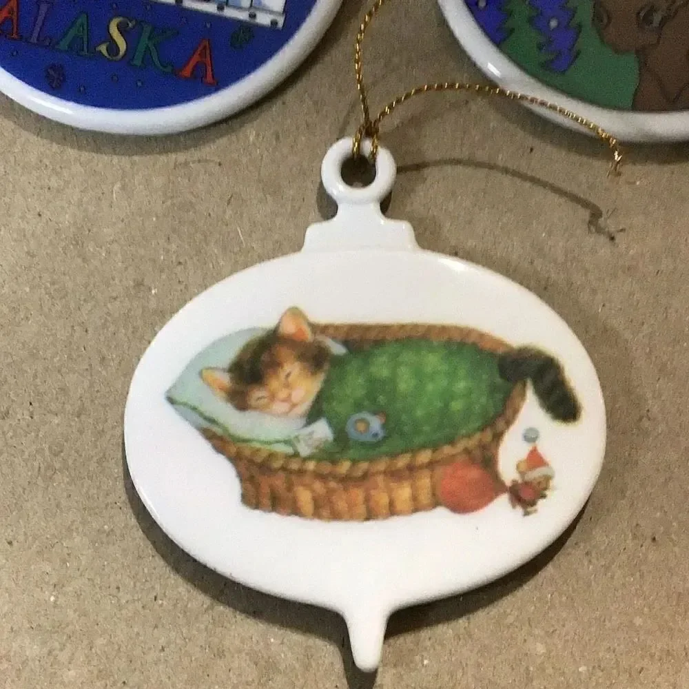 Set of six porcelain desk ornaments mostly Alaskan
